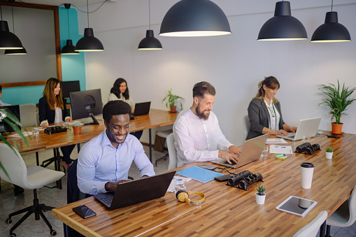 AtlasSwift Logistics team collaborating in a modern office